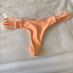 really cheeky neon orange bikini bottoms